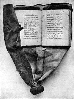 opened-medieval-girdle-book-featured-in-the-grottos-secret.jpg