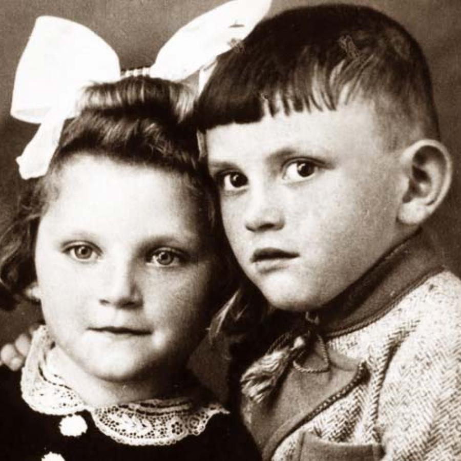 When creating my characters in World War II novel, Flying Without Wings, I came across this war image of a young boy and girl. I created a family for my character, Johan Faulkner. 